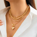 Kit 4 Colares Femininos Trendy Estilo Punk Y2K – Correntes Frisadas Douradas com Pingente de Coração e Fecho OT